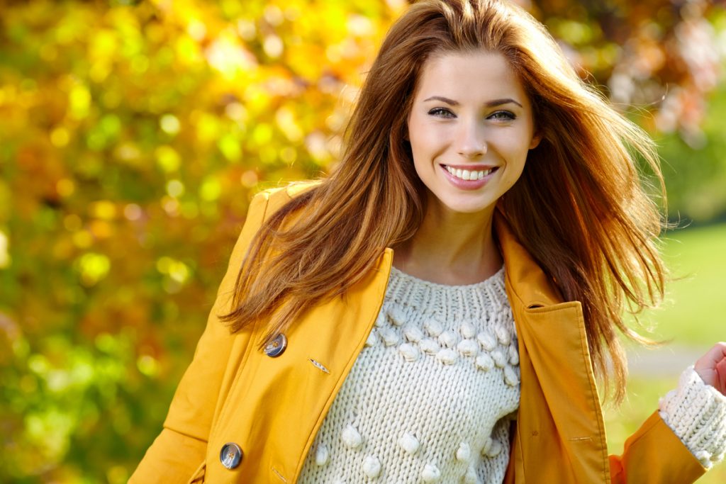 woman in yellow jacket